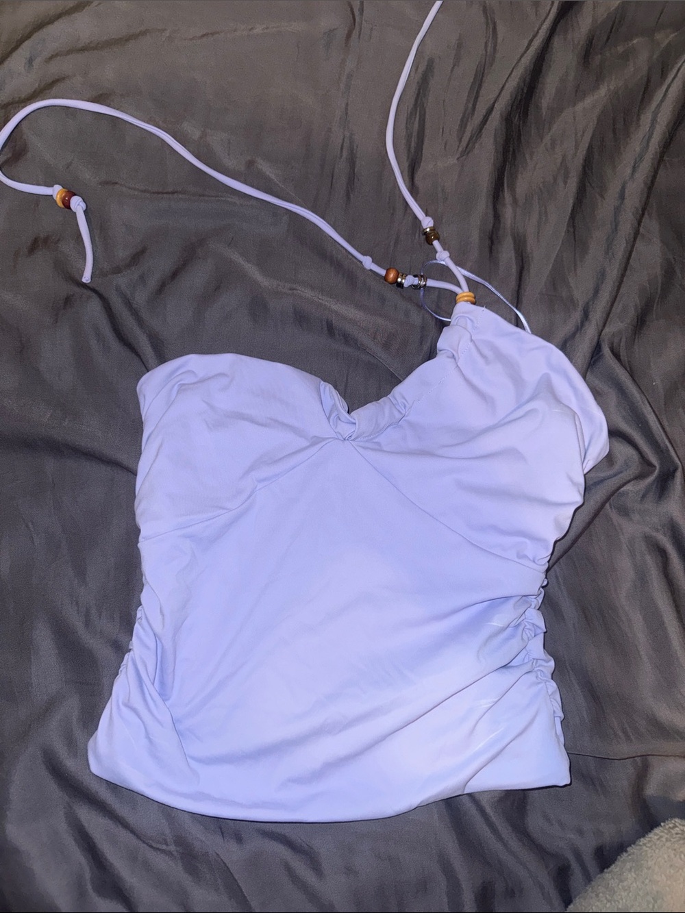 Asymmetrical tie halter top